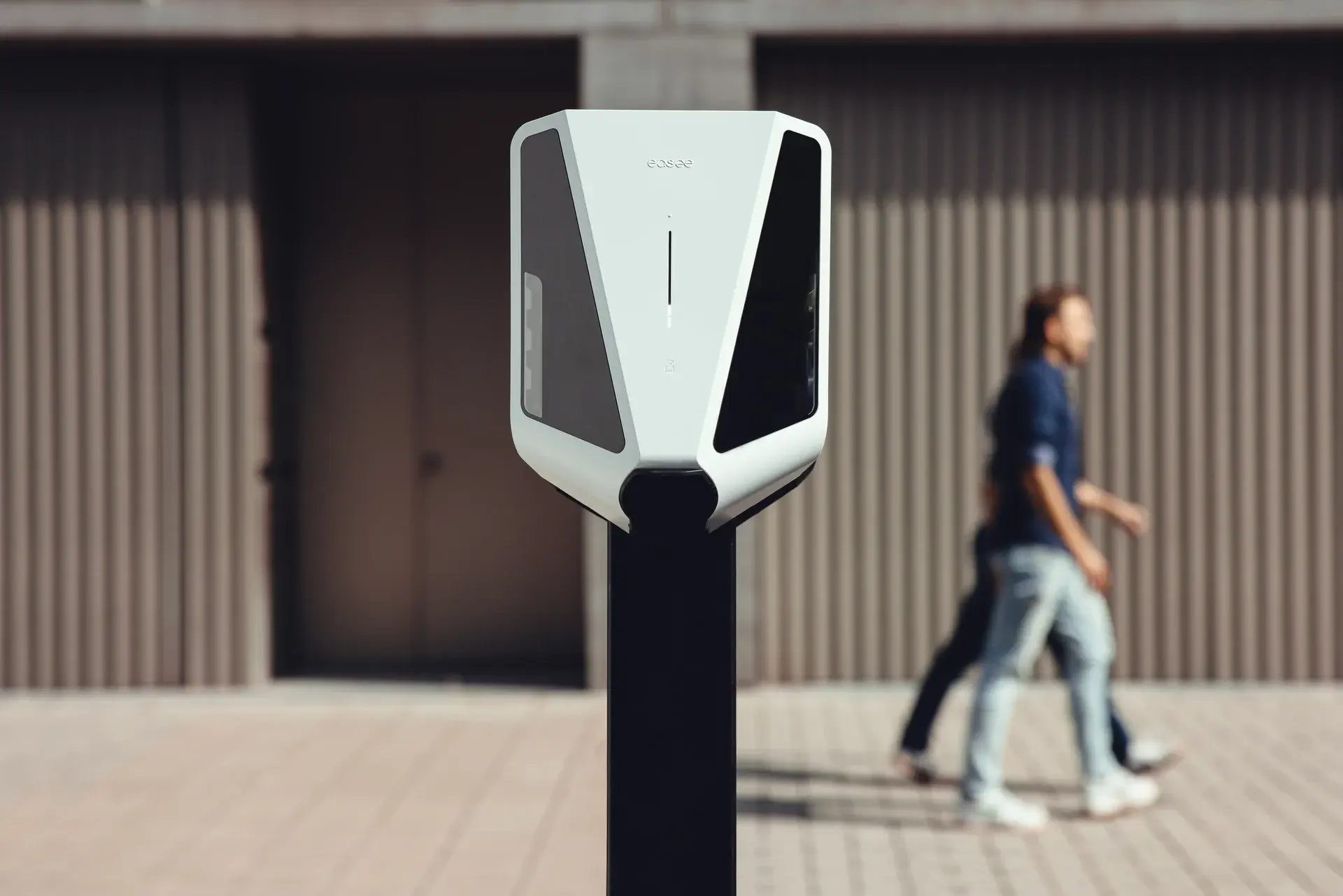 Easee Charge Max EV charger installed on house facade